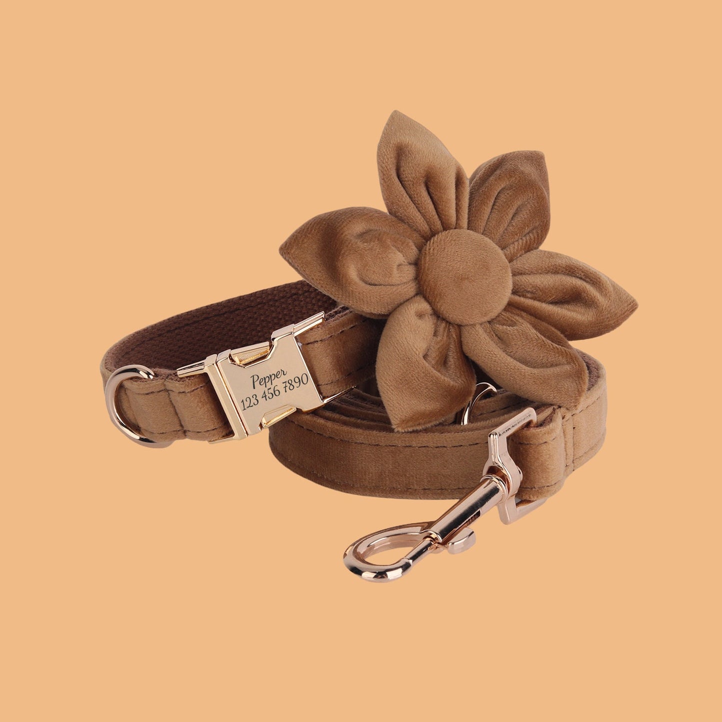 a dog leash with a flower on it