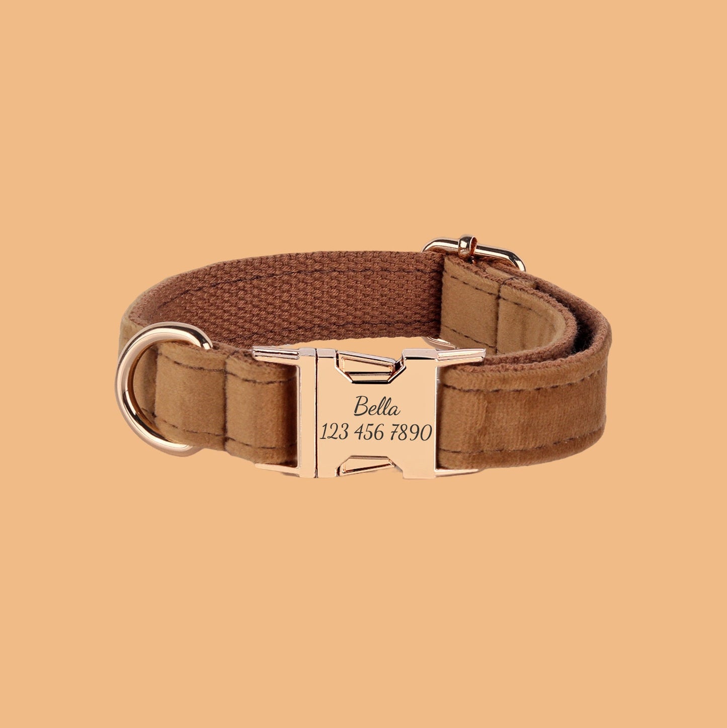 a brown dog collar with a gold buckle