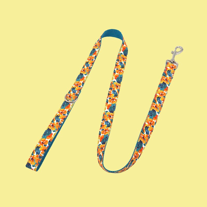 a dog leash with a flower pattern on it